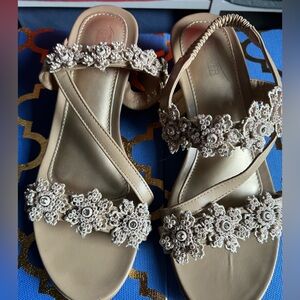 Beautiful sandals with sparkles and floral detail